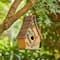 Glitzhome® 9.5" Yellow Distressed Wood Birdhouse with Leaves